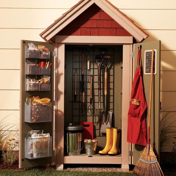This outdoor shed/closet is small, but compact. It'll hold most of ...