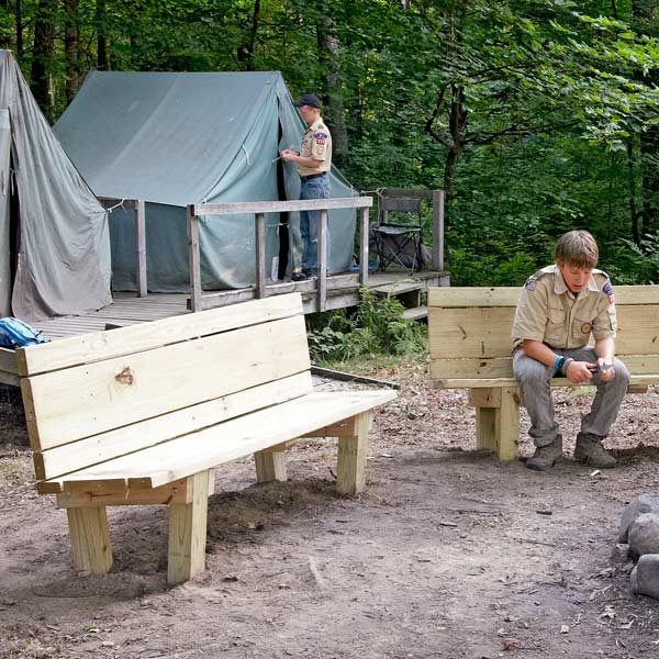 This simple, sturdy campfire bench is perfect for the back yard or 