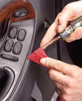 A flat screwdriver and a rag cleans most dash details.