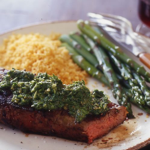 Image of Chimichurri Steak, Chicken Or Pork Chops With Asparagus And Tomato Couscous, Rachael Ray Magazine